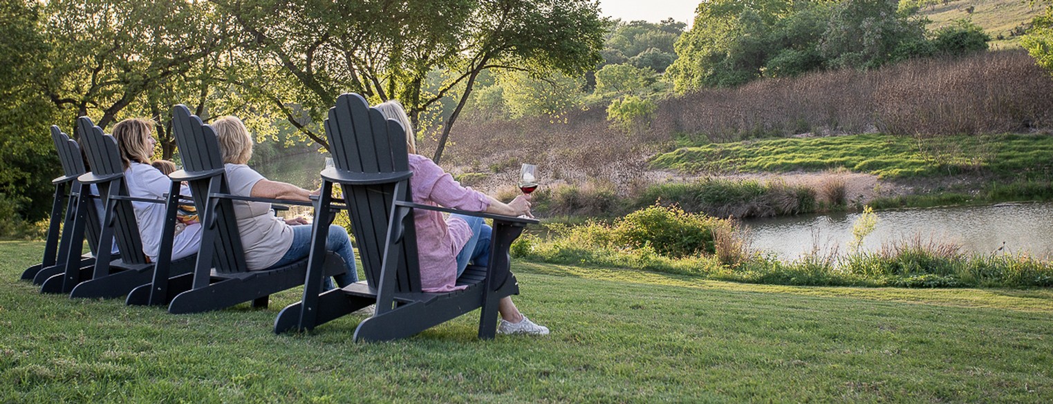 Arrowhead Creek Vineyards - Sitting in chairs by creek